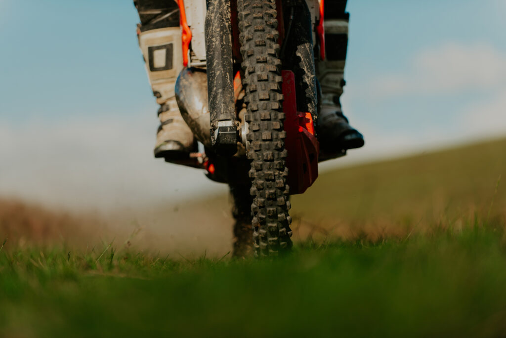 Professional enduro bike rider on action. Motocross sport.